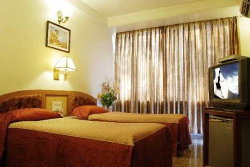 Hotel Mandakini Ambience Pune Pokój zdjęcie